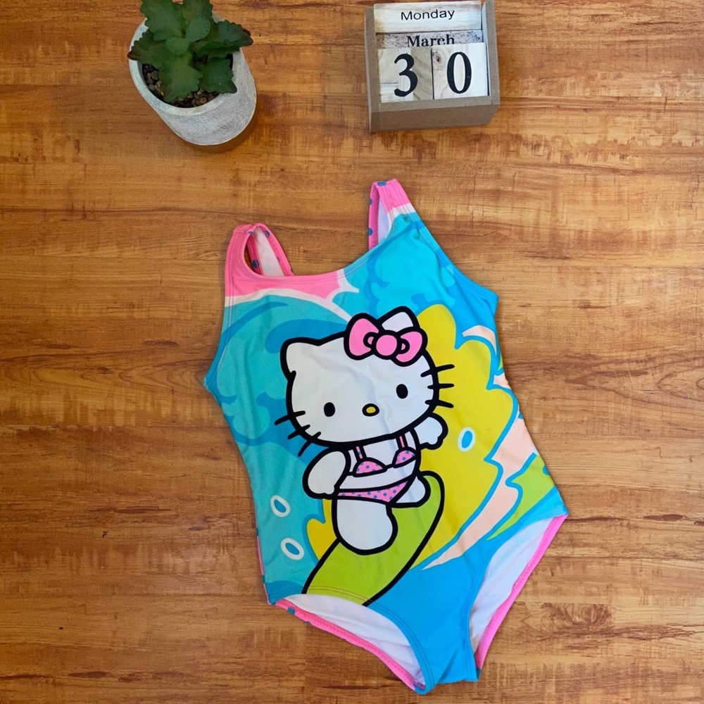 GIRLS BUBDLE OF BATHING SUITS . Size 7/8
